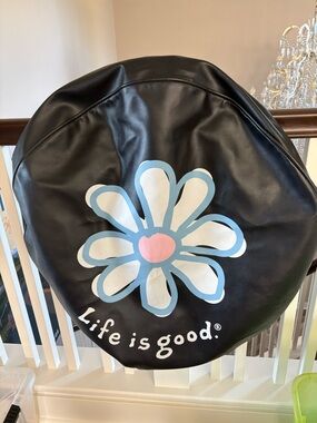 Black “JEEP “ Tire Cover made by Life is Good .